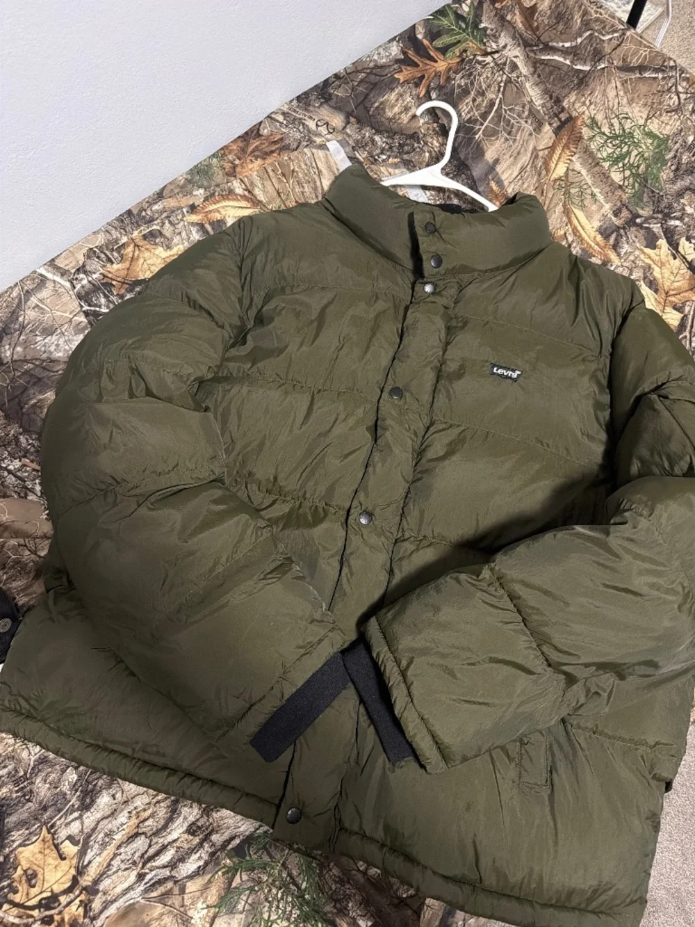 Army green Levi’s puffer coat